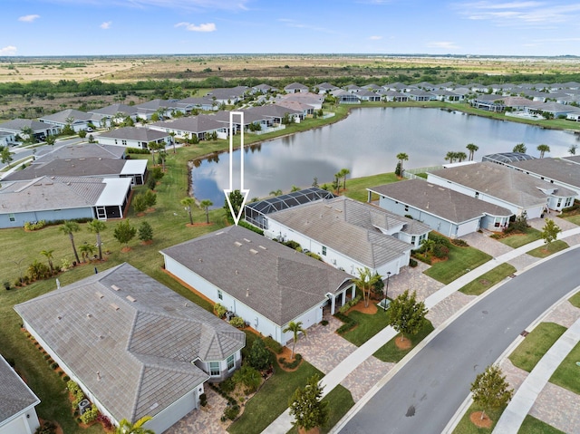 drone / aerial view featuring a water view