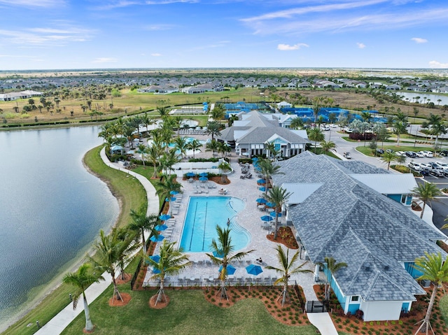 birds eye view of property featuring a water view