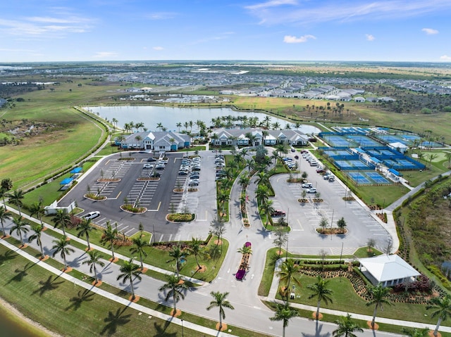 drone / aerial view with a water view