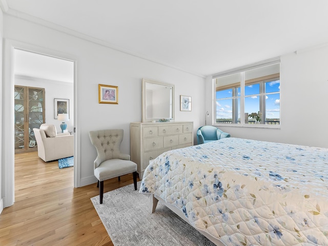 bedroom with light wood-type flooring