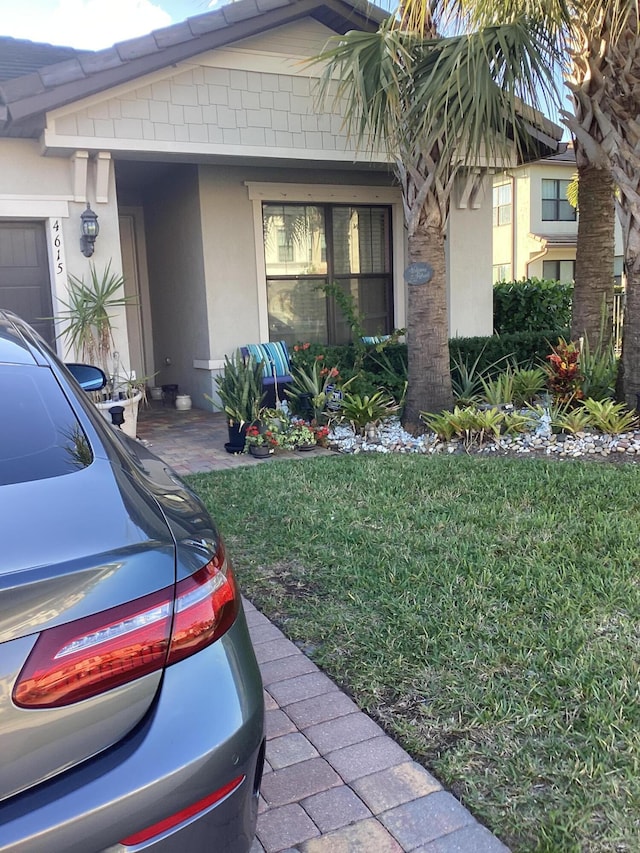 view of home's exterior with a yard