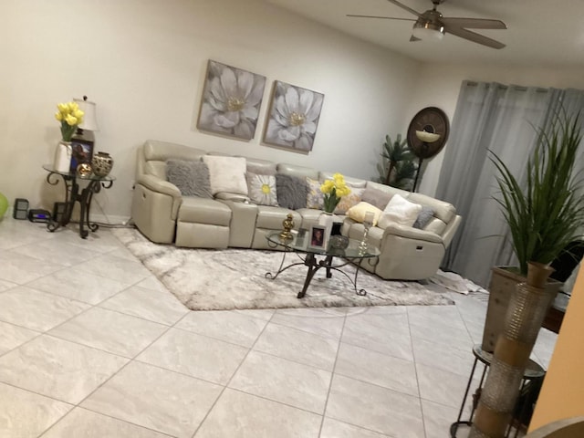 tiled living room with ceiling fan