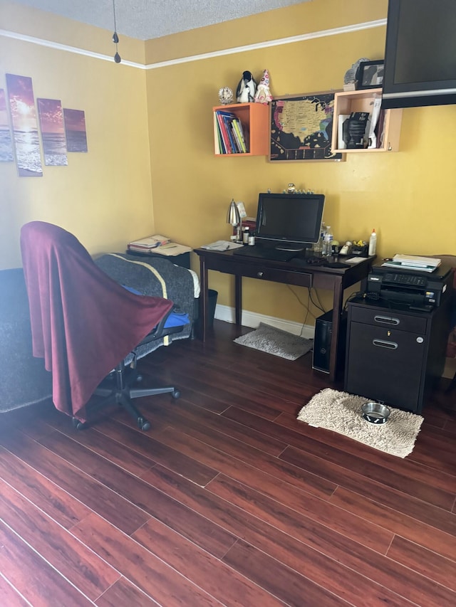 office area featuring dark hardwood / wood-style floors and a textured ceiling