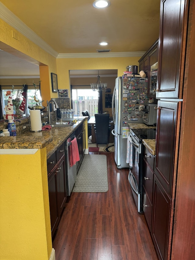 kitchen featuring ornamental molding, appliances with stainless steel finishes, dark hardwood / wood-style floors, and sink