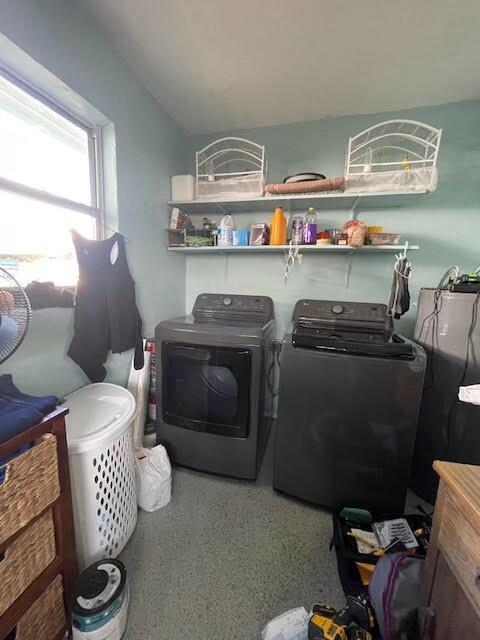 laundry room with washer and dryer