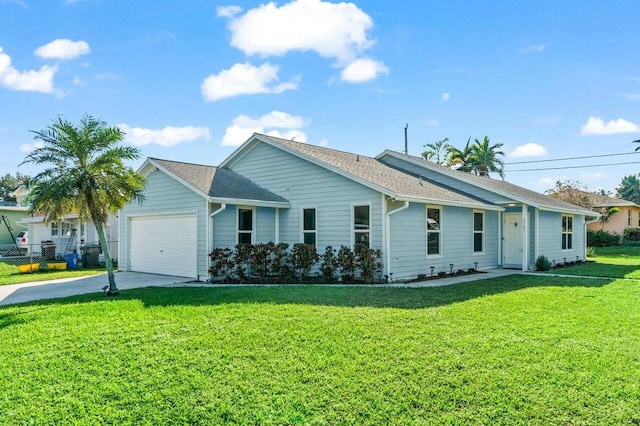 single story home featuring a garage and a front yard