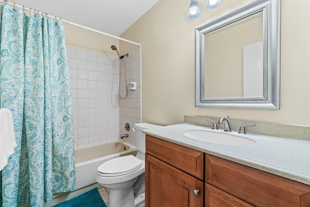 full bathroom featuring vanity, shower / bath combo, and toilet