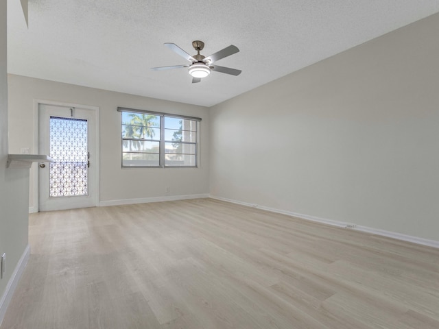 2030 Hythe B 2030, Boca Raton, FL 33434 - empty room featuring ceiling fan, a textured ceiling, and light wood-type flooring