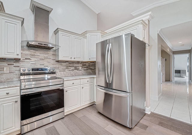 kitchen featuring appliances with stainless steel finishes, ornamental molding, custom exhaust hood, and backsplash