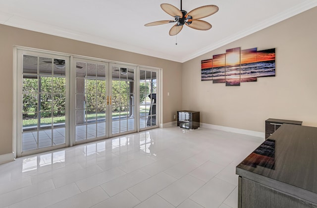 unfurnished living room with ceiling fan and crown molding