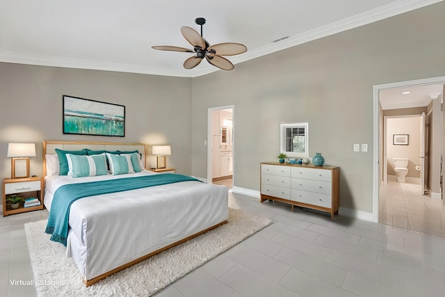 bedroom with ornamental molding, ensuite bathroom, and light tile patterned floors