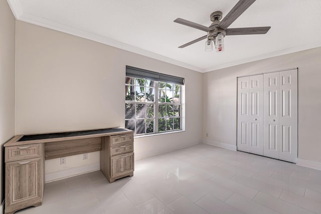 unfurnished office with ceiling fan and ornamental molding