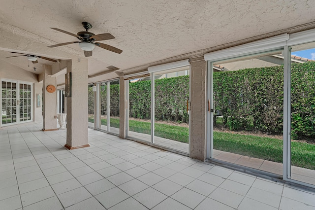 unfurnished sunroom with lofted ceiling