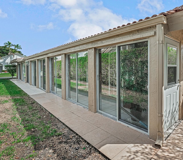 exterior space with a sunroom