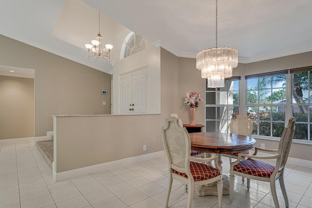 tiled dining room featuring ornamental molding, lofted ceiling, and an inviting chandelier