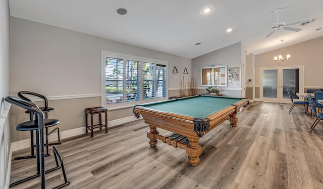 recreation room featuring light hardwood / wood-style flooring, pool table, vaulted ceiling, and french doors