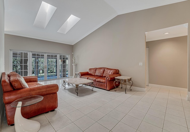 tiled living room featuring high vaulted ceiling, crown molding, french doors, and a skylight