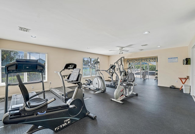 workout area with plenty of natural light and ceiling fan