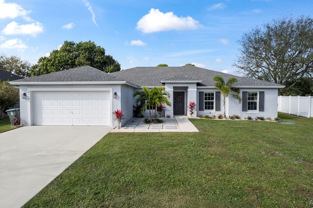 ranch-style house featuring a garage and a front lawn