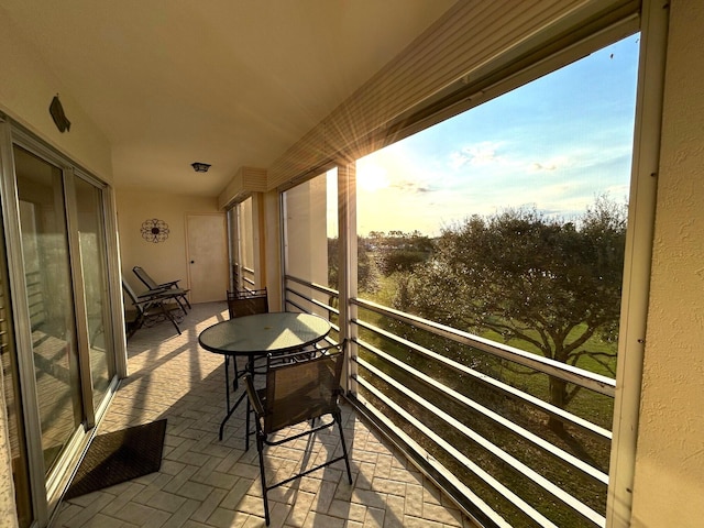 view of balcony at dusk