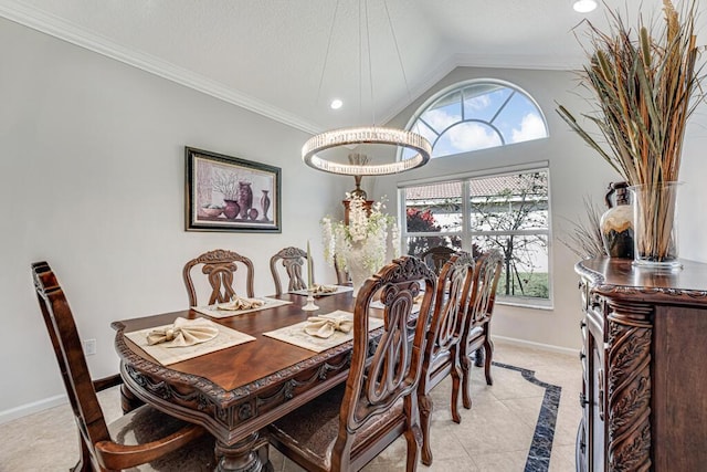 dining space with vaulted ceiling, a healthy amount of sunlight, and crown molding