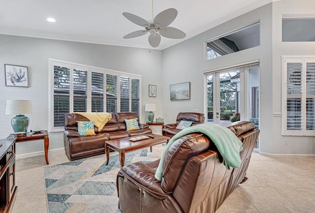 tiled living room featuring french doors, ceiling fan, and ornamental molding