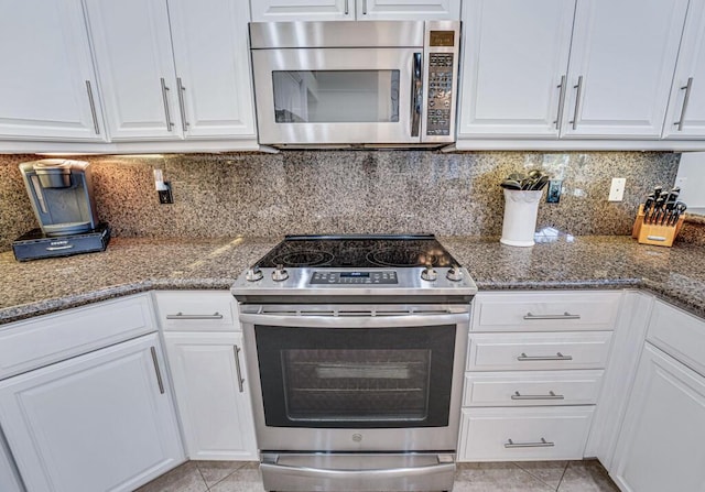 kitchen with white cabinetry and stainless steel appliances