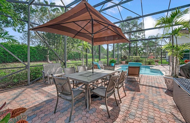 view of patio / terrace featuring glass enclosure