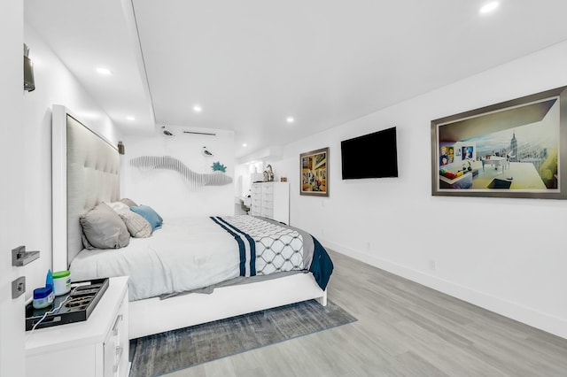 1155 Hillsboro Mile Unit 202, Hillsboro Beach, FL 33062 - bedroom with light hardwood / wood-style flooring