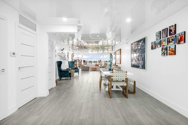 1155 Hillsboro Mile Unit 202, Hillsboro Beach, FL 33062 - dining area featuring hardwood / wood-style floors