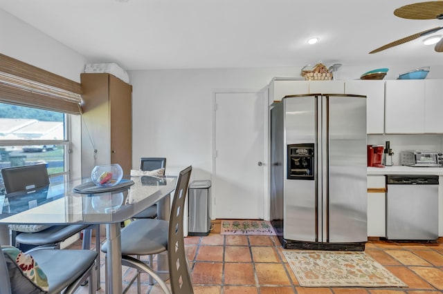 kitchen featuring white cabinetry, ceiling fan, and stainless steel appliances