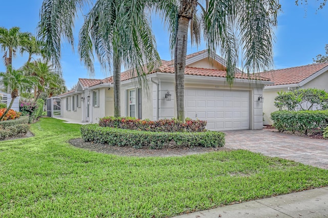 view of front facade featuring a garage and a front lawn