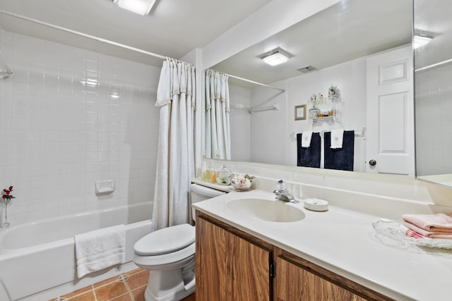 full bathroom with tile patterned floors, toilet, shower / tub combo, and vanity