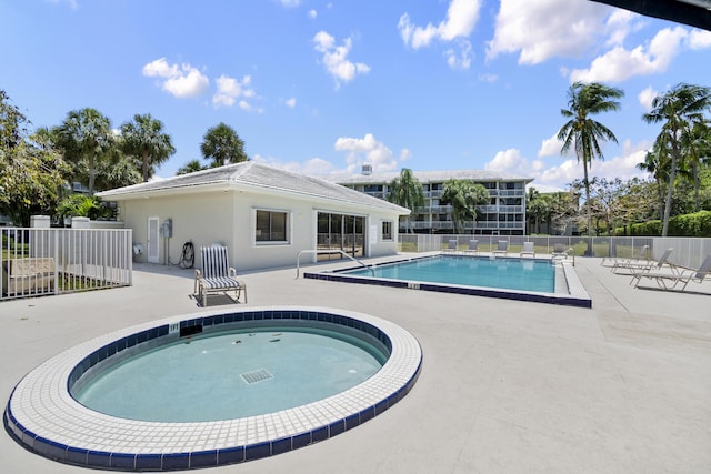 view of pool featuring a patio area