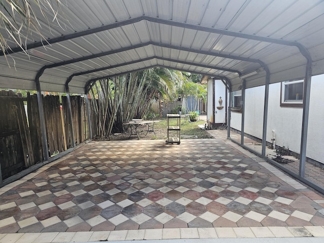 view of parking / parking lot with a carport