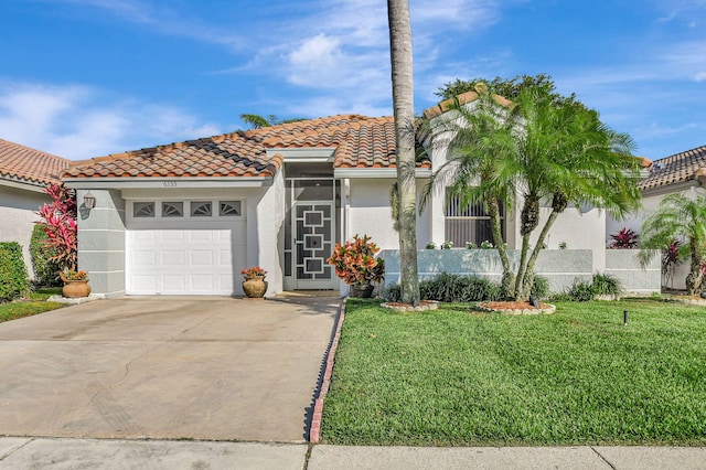 mediterranean / spanish-style home with a garage and a front yard