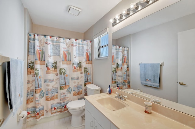 bathroom featuring walk in shower, vanity, and toilet