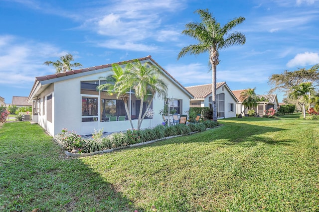 exterior space with a yard