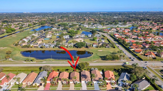 birds eye view of property featuring a water view