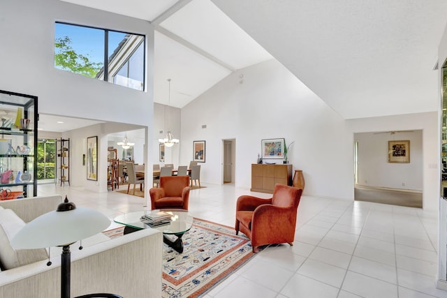 living room with vaulted ceiling, light tile patterned floors, and a notable chandelier