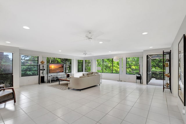 tiled living room featuring ceiling fan