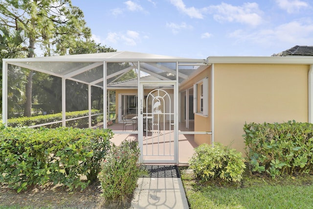 doorway to property featuring a patio