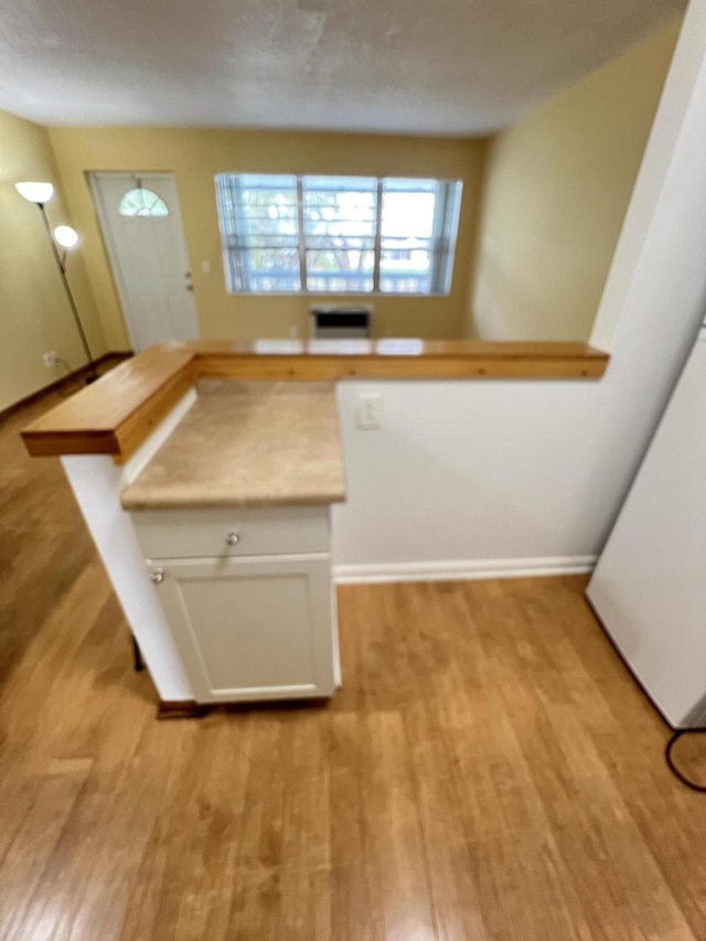 kitchen with light hardwood / wood-style flooring