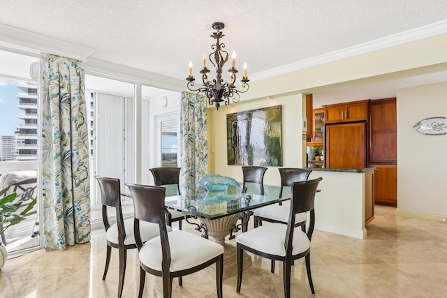 dining space featuring crown molding, an inviting chandelier, and a textured ceiling