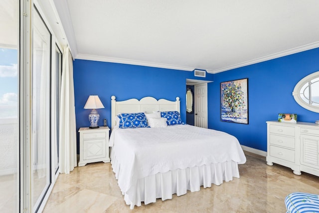 bedroom with crown molding