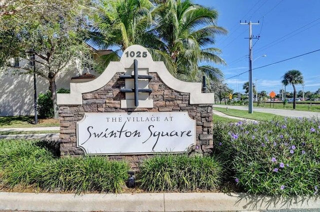 view of community sign