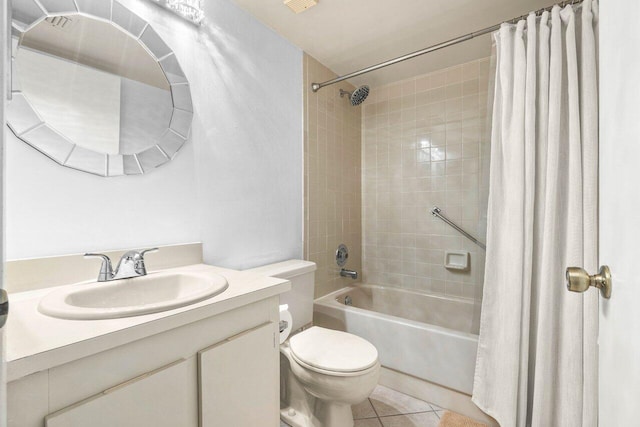 full bathroom with tile patterned floors, toilet, shower / tub combo, and vanity