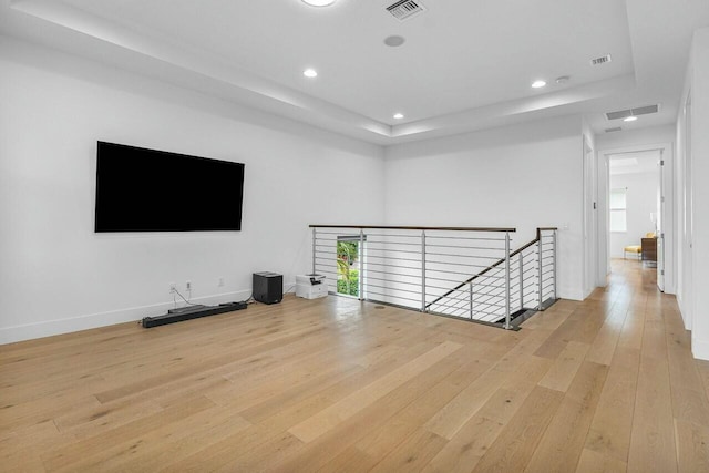 unfurnished living room featuring light hardwood / wood-style flooring