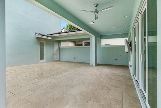 view of patio with ceiling fan