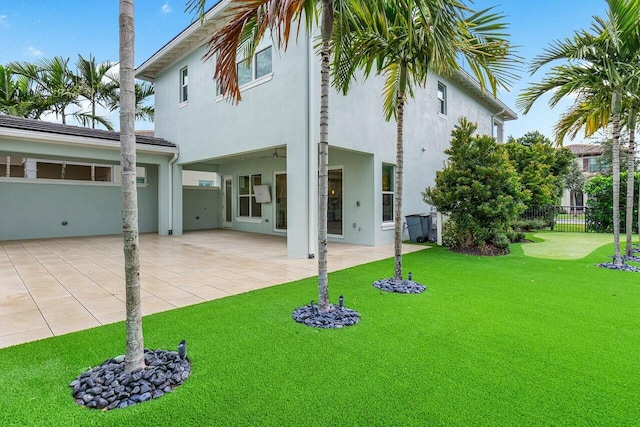 back of house featuring a patio